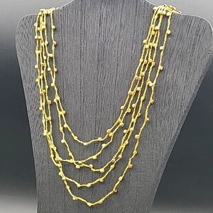 Gold-bead layered necklace